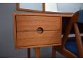 The dressing table contains 2 small drawers and 1 larger drawer.