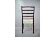 The dark wood frame with ladder back design offer comfortable seating