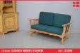 Small 2 seater sofa in solid oak with green cushions - view 1