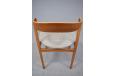 Danish cabinetmaker made oak frame dining chair with curved teak backrest and blue upholstery for sale