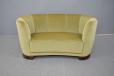 Compact 2 seat curved frame sofa by Danish Cabinetmaker