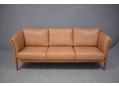 Stylish box 3 seat sofa with slender frame and supportive comfortable cushions.