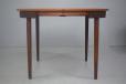 Vintage teak dining table with 6 matching chairs and new upholstery