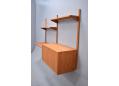  2 bay Danish shelving system in teak with 3 shelves & 1 cabinet.