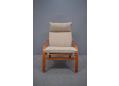 Beech & fabric modern armchair with reclining high back.