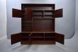 Tall rosewood wall unit with lots of storage space.
