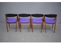 Model 31 dining chairs in teak with black back and purple seat
