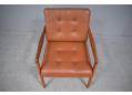 France & Daverkosen armchair in teak and original leather. Model FD119