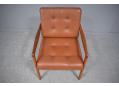 France & Daverkosen armchair in teak and original leather. Model FD119