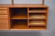 Midcentury teak 2 bay CADO system designed in 1960 by Poul Cadovius