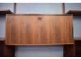 Rosewood wallmounted shelves & cabinets by HG Mobler.