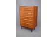 Spacious teak chest of drawers with carved lip pull hanles