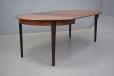 Round rosewood dining table with 3 extra leaves by Danish Mobelfabrik