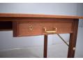 Minimalist Danish teak desk with 2 deep drawers.