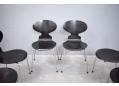 Model 3101 stacking ANT dining chair with black finish by Fritz Hansen.
