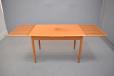 ABJ Production vinatge teakdining table with 2 draw leaves