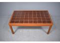Teak lounge table with tiled for hard wear. 