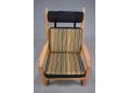 Midcentury Danish design armchair with light oak frame.