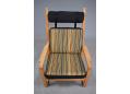 Midcentury Danish design armchair with light oak frame.