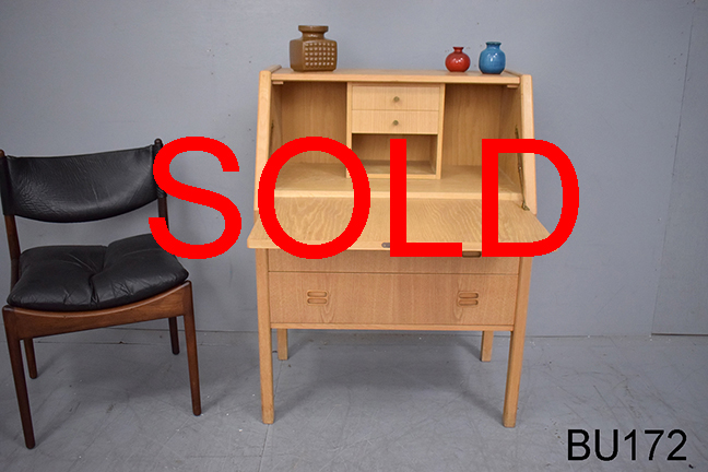 Vintage ladies writing bureau in light oak with locking writing surface.