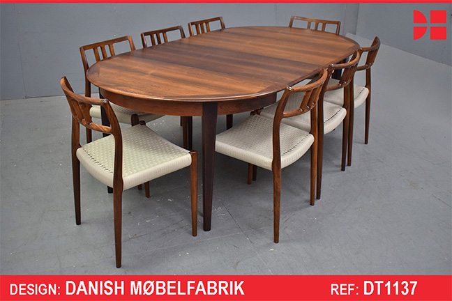 Vintage rosewood round top dining table extending with 3 extra leaves