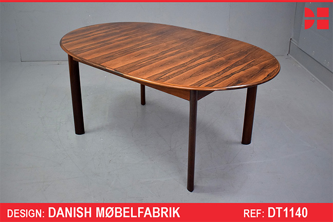 Vintage rosewood oval top dining table with 2 fold-out leaves