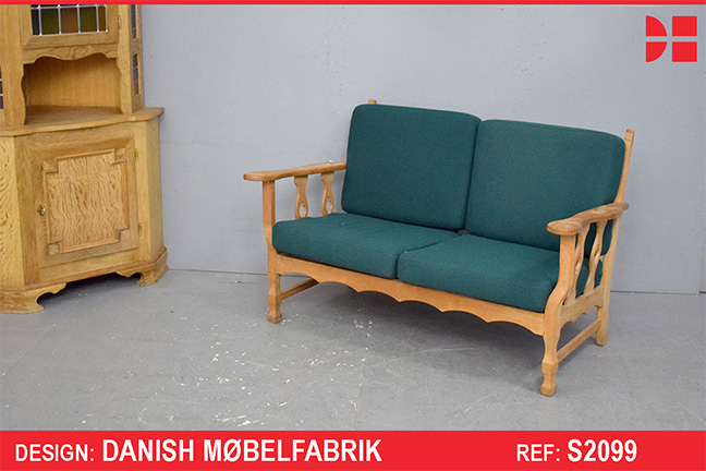 Small 2 seater sofa in solid oak with green cushions