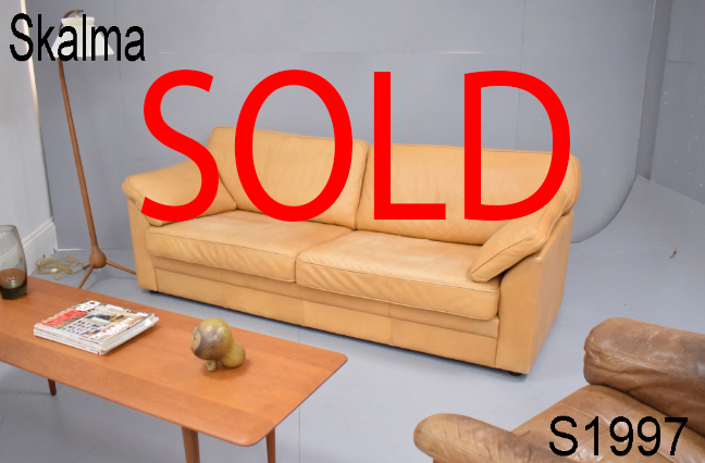 Tan leather over size 2 seat sofa by SKALMA