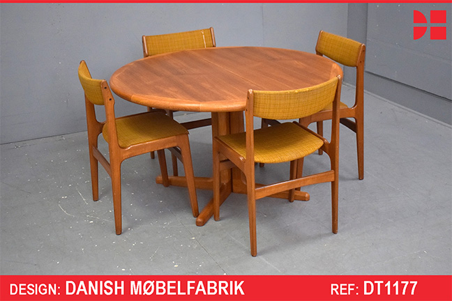Round teak pedestal leg dining table produced by Danish Mobelfabrik