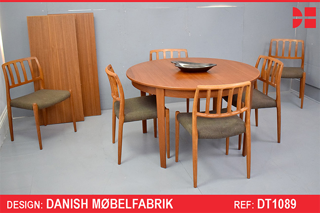 Vintage circular dining table in teak on triangular legs