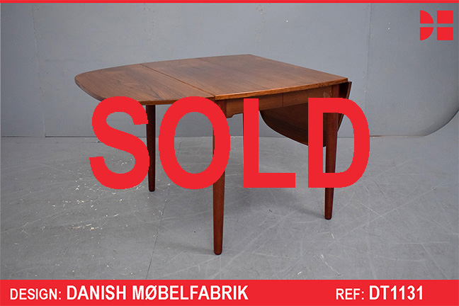Small drop-leaf dining table in vintage rosewood