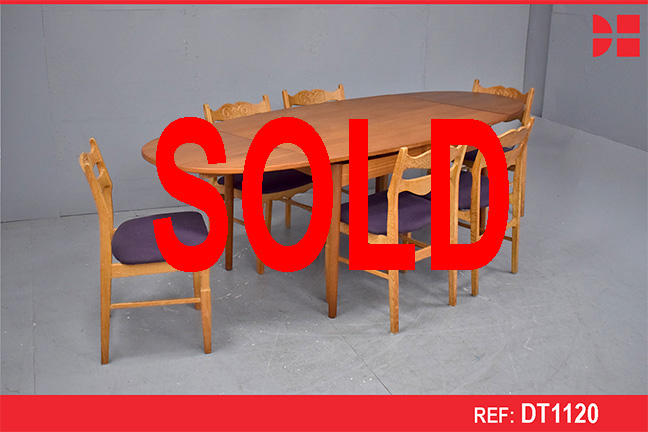 Vintage teak dining table extending with 2 draw leaves